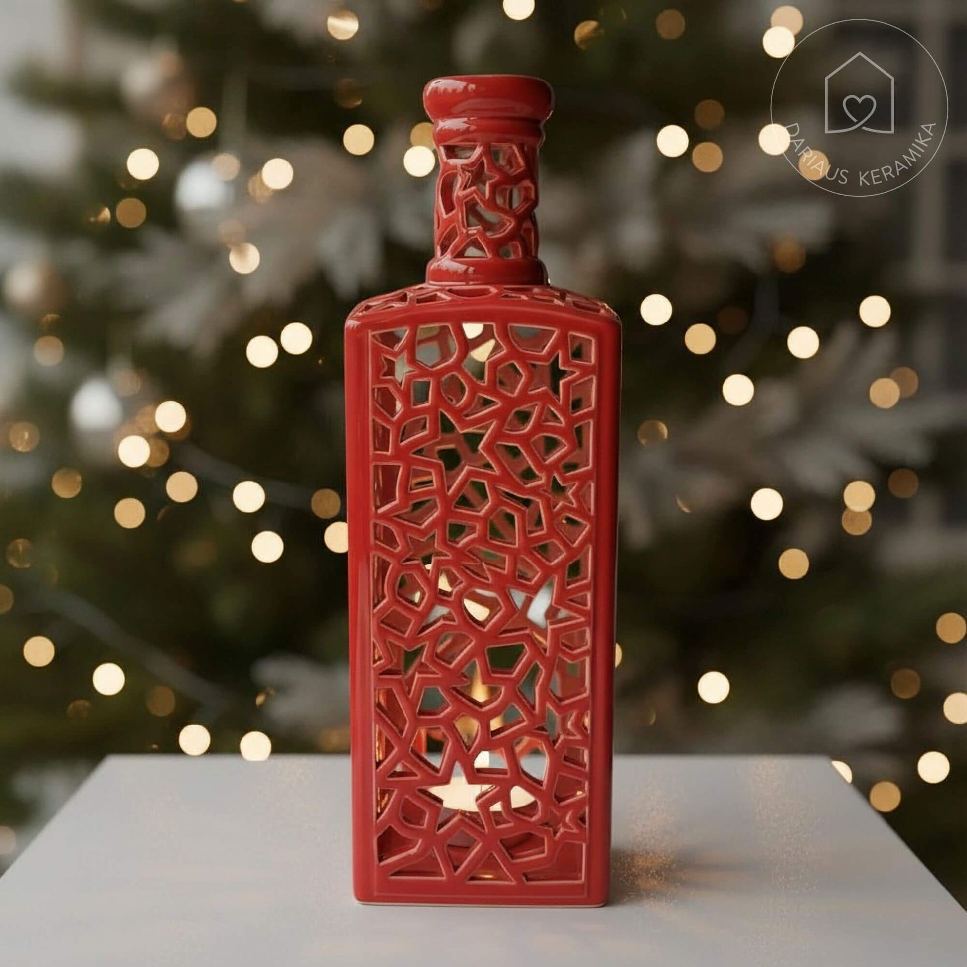 Ažūrinė rankų darbo keraminė žvakidė butelio formos interjerui